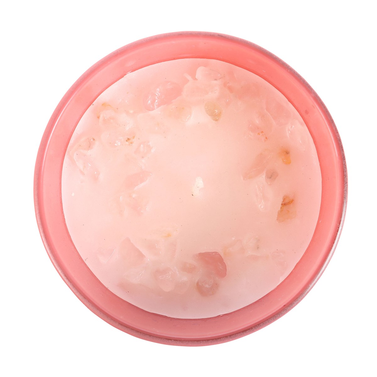 Vela aromática rosa com pedras decorativas num recipiente rosa vista de cima