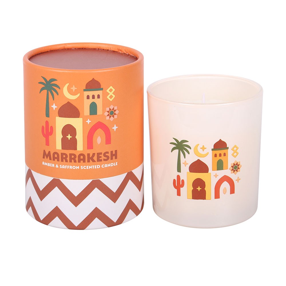 Vela perfumada Marrakesh em copo branco com embalagem castanha decorada