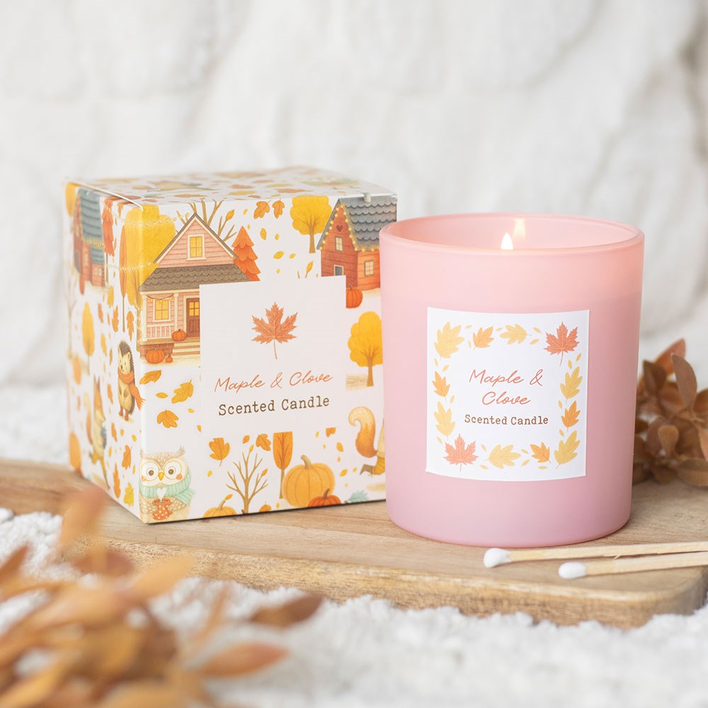 Vela perfumada rosa com embalagem decorada de outono