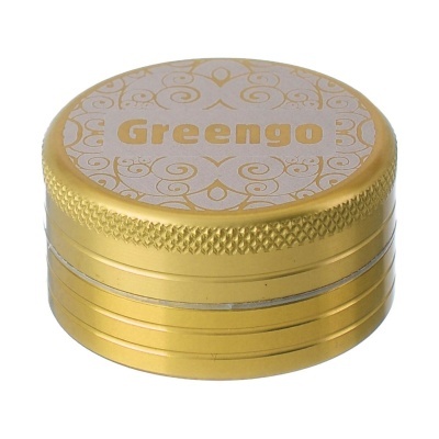 Triturador redondo dourado com padrão decorativo e texto 'Greengo' no topo
