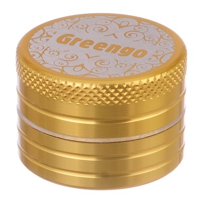 Triturador de ervas dourado com padrão e texto Greengo no topo