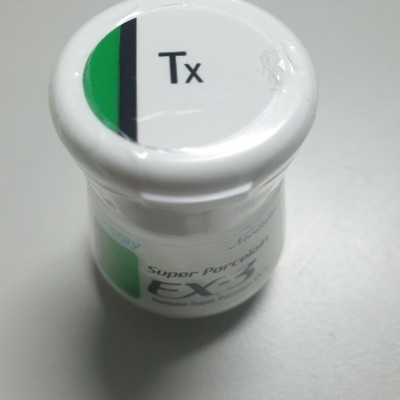 Frasco branco com tampa e etiqueta com texto Tx e Super Porcelain EX-3