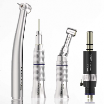 Equipamento odontológico metálico e plástico prateado e preto sobre fundo branco