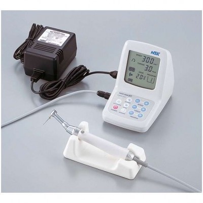 Aparelho odontológico branco com controlador digital e adaptador de energia