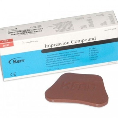 Material de impressão dental Kerr Impression Compound com embalagem e bloco castanho