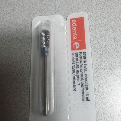 Ferramenta rotativa metálica embalada em blister com informações da empresa edenta