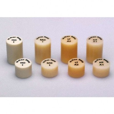 Oito amostras cilíndricas creme e bege com códigos alfanuméricos em cima