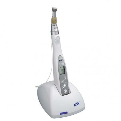 Dispositivo odontológico branco com visor digital e base de carregamento