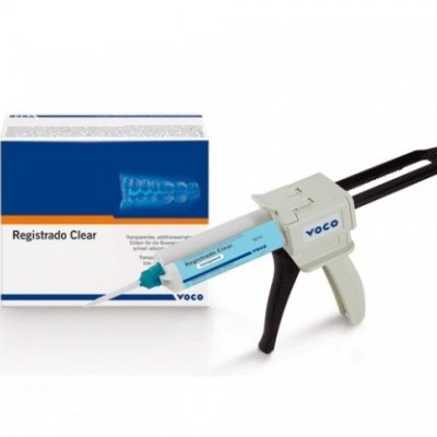Kit dentário VOCO Registrado Clear com seringa e caixa azul e branca.