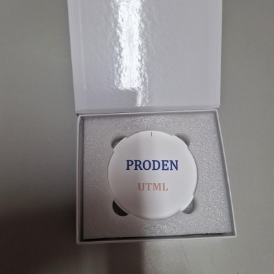 White circular product with PRODEN and UTML text in box