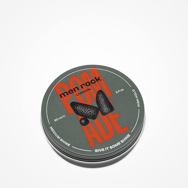 Embalagem de lata arredondada com design cinzento e texto laranja para cera de cabelo men rock London.