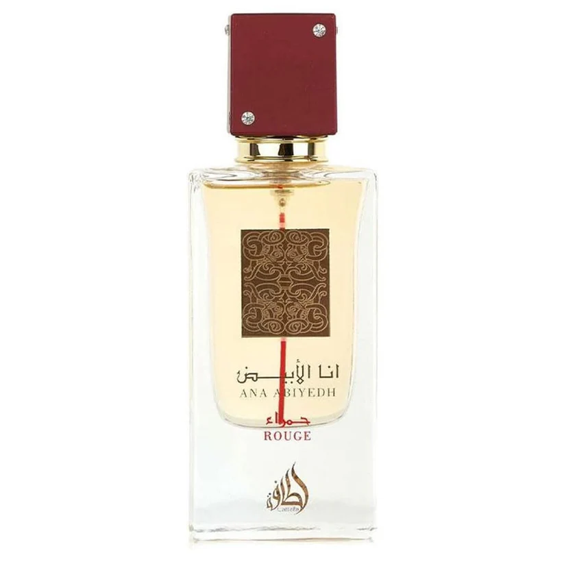 Frasco de perfume translúcido com tampa vermelha e rótulo decorativo