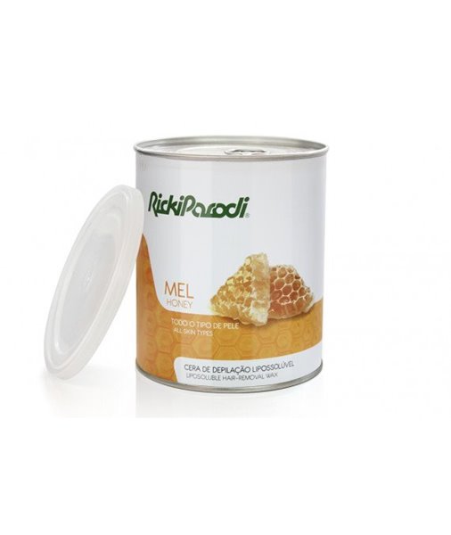 Lata de cera depilatória lipossolúvel com rótulo branco e imagem de favo de mel
