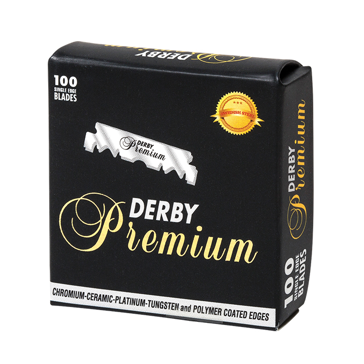 Embalagem preta de lâminas de barbear Derby Premium com texto em branco e dourado