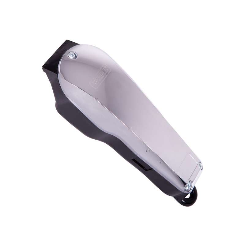 Aparador de cabelo preto com parte superior metálica prateada isolado em fundo branco