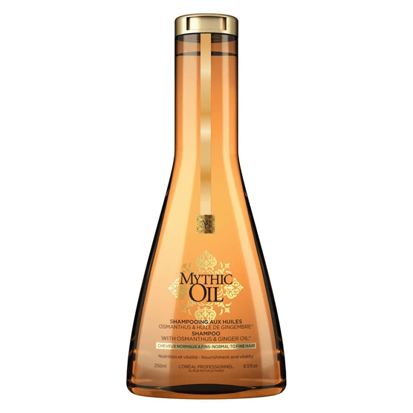 Frasco âmbar de shampoo Mythic Oil da L'Oréal com tampa dourada