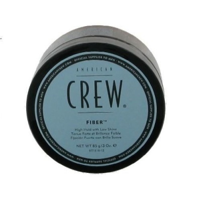 Embalagem redonda preta com rótulo azul do produto American Crew Fiber para cabelo