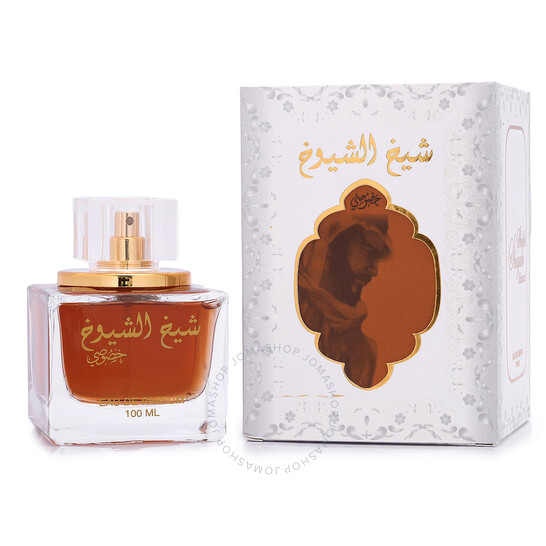 Frasco de perfume com líquido âmbar e caixa branca com padrão floral e imagem marrom