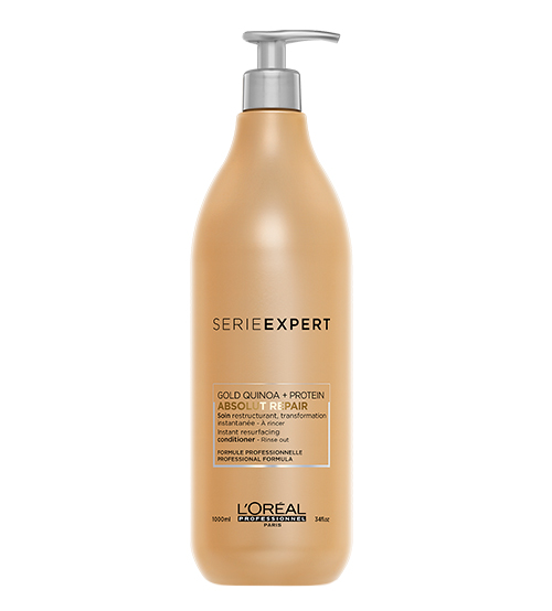 Frasco dourado com tampa de bomba L'Oréal Série Expert Absolute Repair