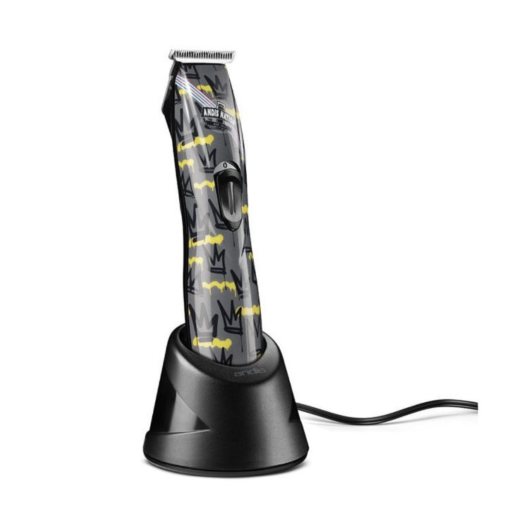 Aparelha de corte de cabelo elétrica com padrão camuflado cinzento e amarelo na base preta de carregamento