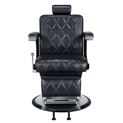 Cadeira de barbeiro em couro preto com padrão acolchoado em losangos