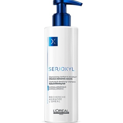 Frasco de champô branco e azul L'Oréal Serioxyl