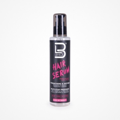 frasco preto de sérum para cabelo com tampa de bomba