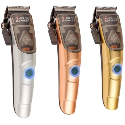 Três máquinas de cortar cabelo X-ERGO Gamma+ em prateado, cobre e dourado