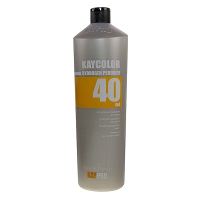 Frasco cinzento com tampa preta e etiqueta amarela de produto para cabelo KAYCOLOR 40 VOL