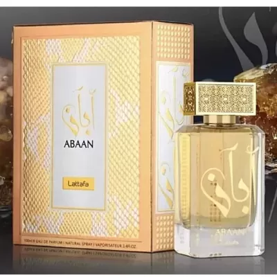 Frasco de perfume e caixa dourada com texto ABAAN Lattafa