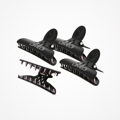 Conjunto de ganchos de cabelo pretos com texto LEVEL3 em fundo branco