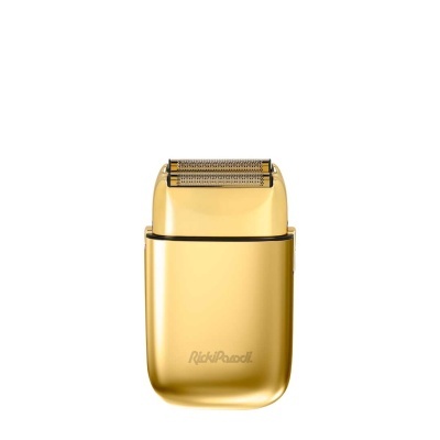 Aparelho de barbear elétrico dourado com texto Rickipussol