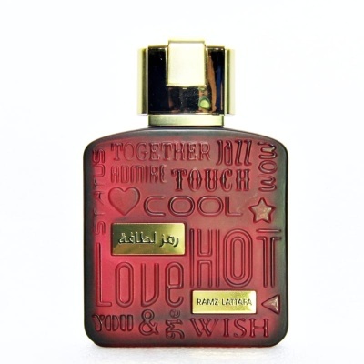 Frasco vermelho de perfume com relevo e tampa dourada