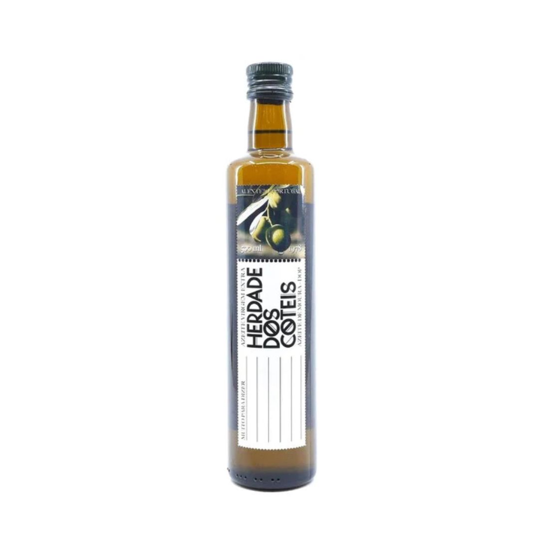 Garrafa de azeite com rótulo HERDADE dos COTES com imagem de azeitonas