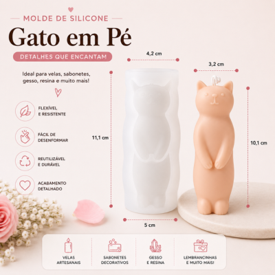 Molde de silicone branco e figura laranja de gato em pé sobre superfície clara com flores ao lado