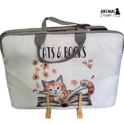 Mala branca e cinza com ilustração de gato sobre livros e texto CATS & BOOKS