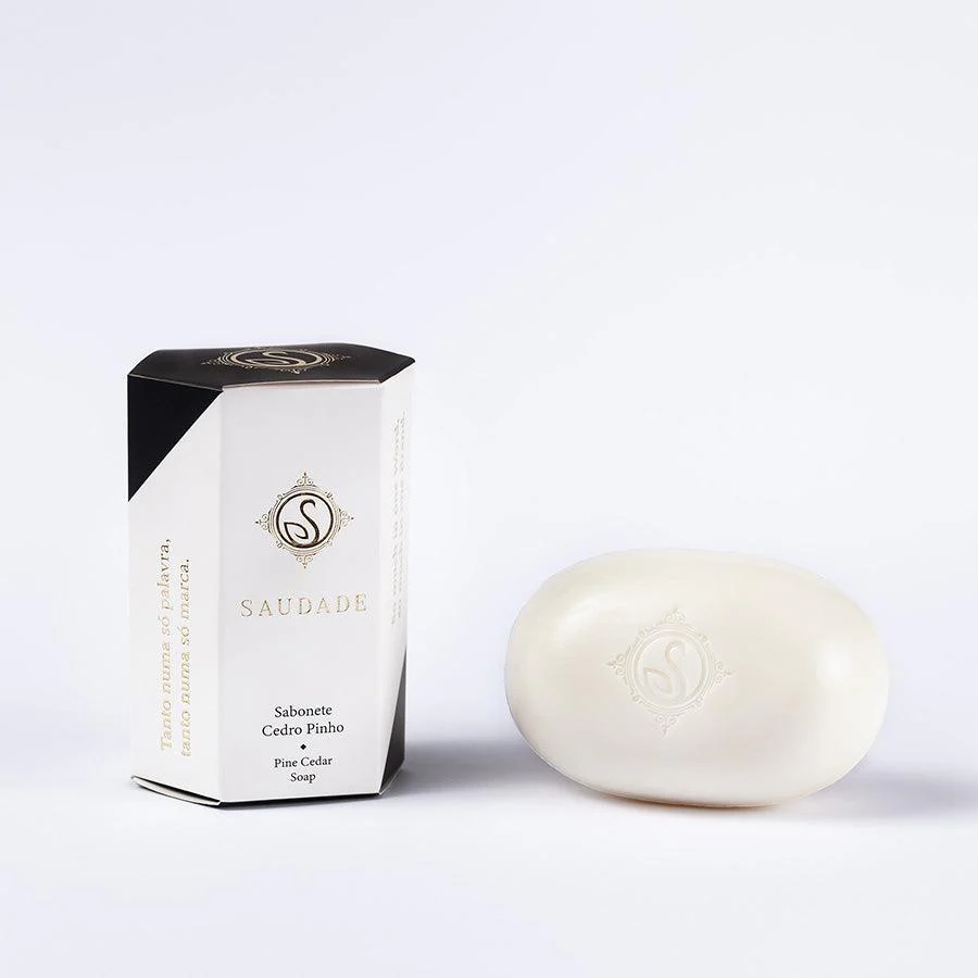 Sabonete branco e embalagem branca e preta Saudade