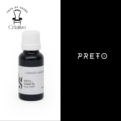 Frasco preto de corante para sabonetes com etiqueta branca e texto visível