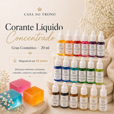 Frascos de corante líquido concentrado em várias cores com sabonetes coloridos ao lado e flores brancas em fundo bege.