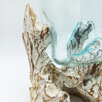 Suporte de cerâmica rústica com vaso de vidro transparente