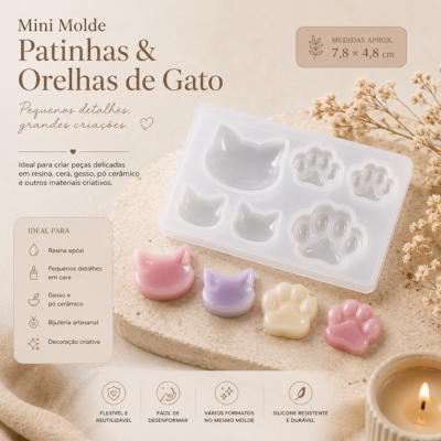 Mini molde branco de silicone com patinhas e orelhas de gato e peças coloridas em rosa e lilás