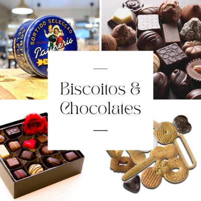 Lata azul de bolachas, chocolates variados em caixas, biscoitos diversos