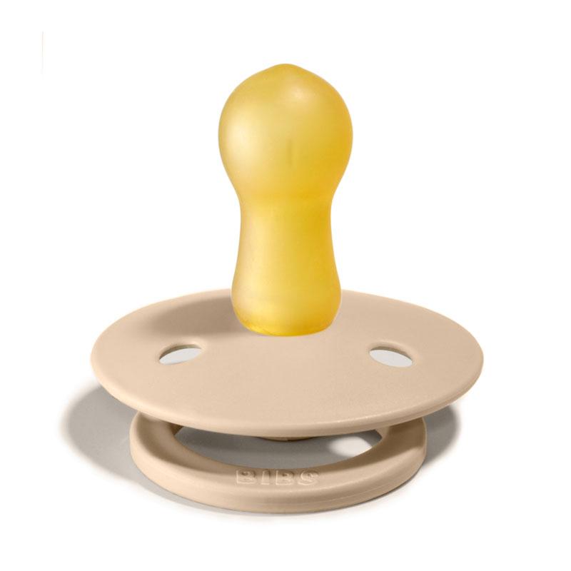 BIBS COLOUR Chupeta de silicone amarelo e plástico bege com base redonda e orifícios