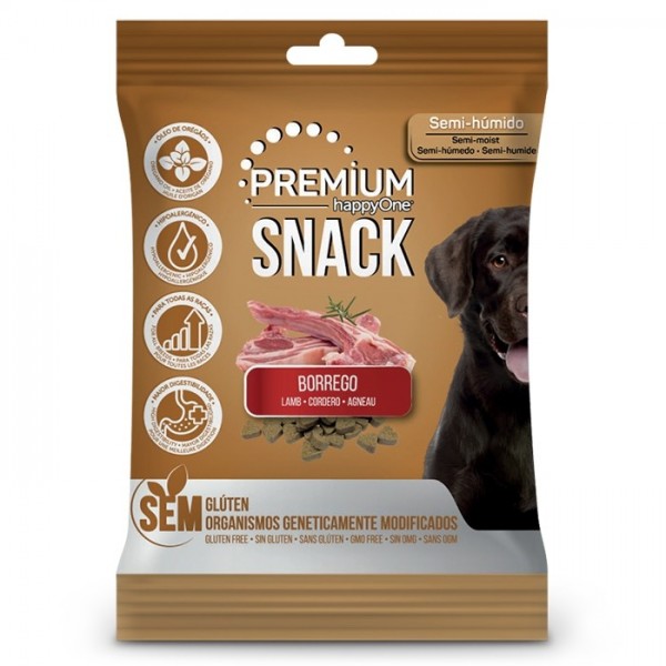 SNACKS HAPPYONE PREMIUM BORREGO 100GR Pacote castanho de snack para cães com imagem de cão preto e carne de borrego