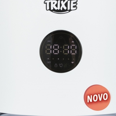 Máquina branca com visor digital redondo preto e textos TRIXIE e NOVO