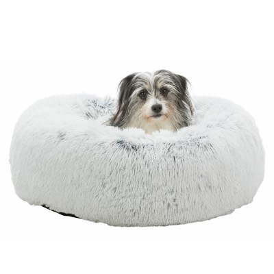 Cão numa cama peluda cinzento claro redonda