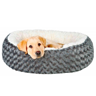 Cama redonda cinzenta para cão com interior branco e cachorro deitado