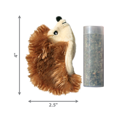 Pelúcia de porco-espinho castanho claro e bege ao lado de recipiente transparente com vegetação seca