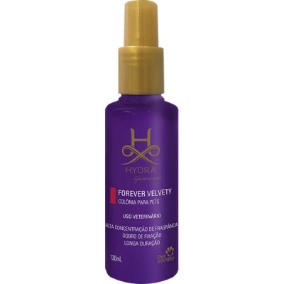 Frasco roxo com tampa dourada e texto branco e dourado