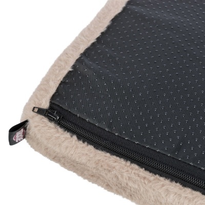 Canto de capa felpuda bege com fecho zipper e parte traseira preta antiderrapante